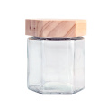 Customized Clear 380ml Hexagonal Glass Honey Jars glass food storage jar With Wooden Lids